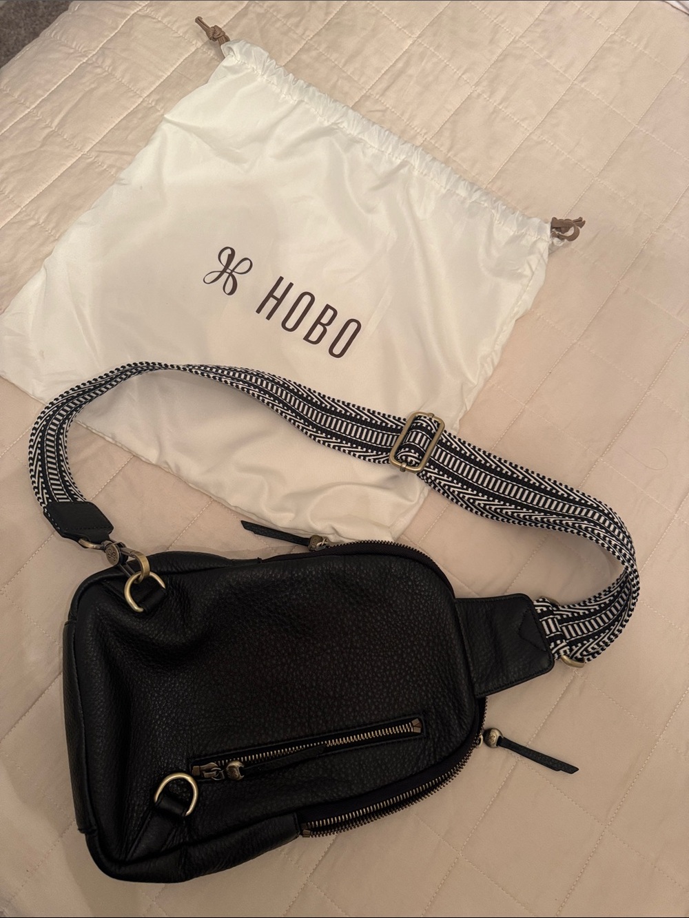 HOBO Black Pebble Leather Crossbody Sling with Patterned Strap